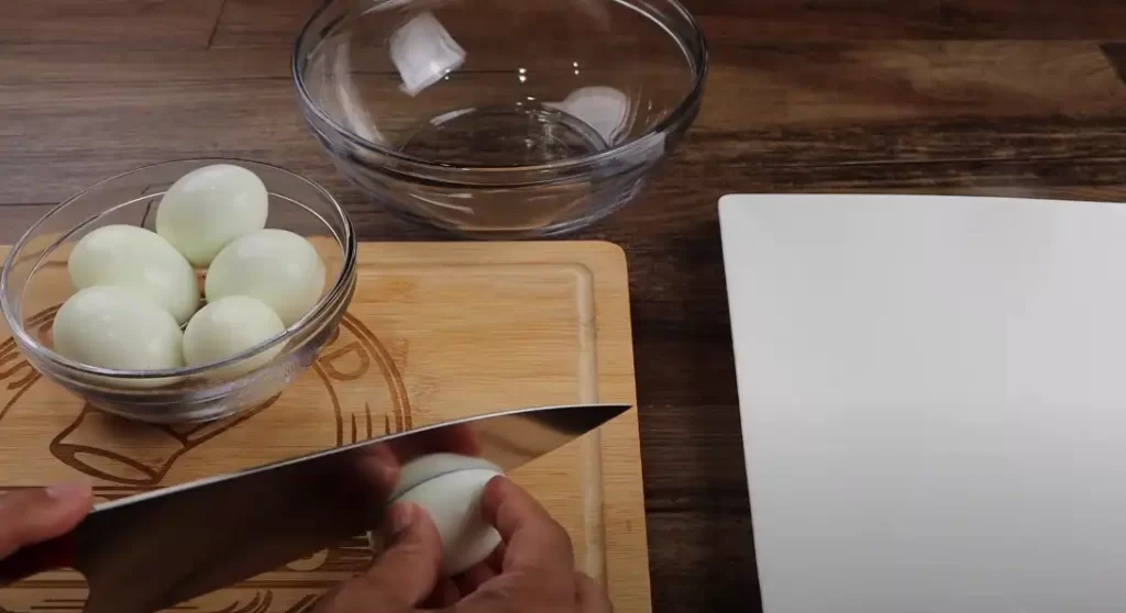 slicing the boiled eggs 